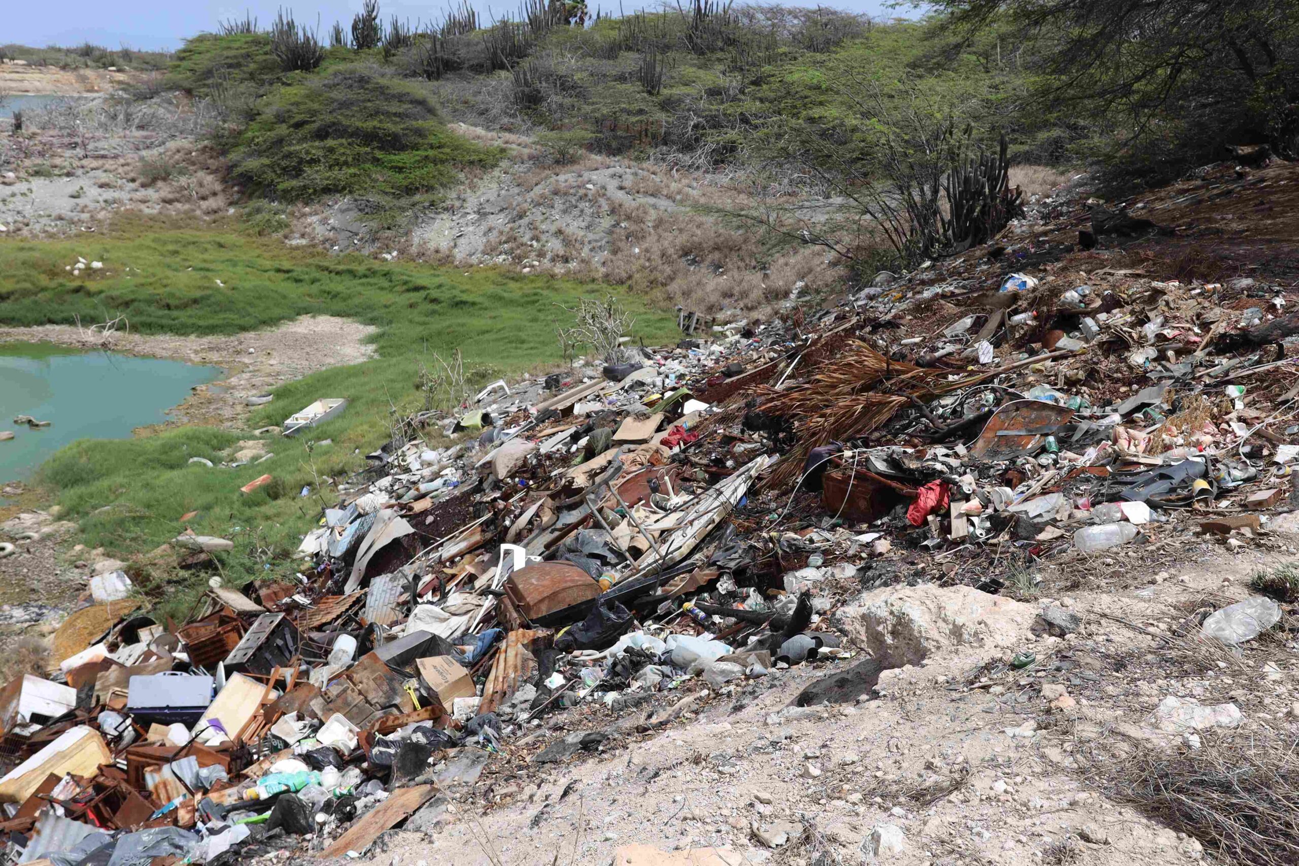Drainage Channel in Hato Resembles a Dump, Poses Flood Risk