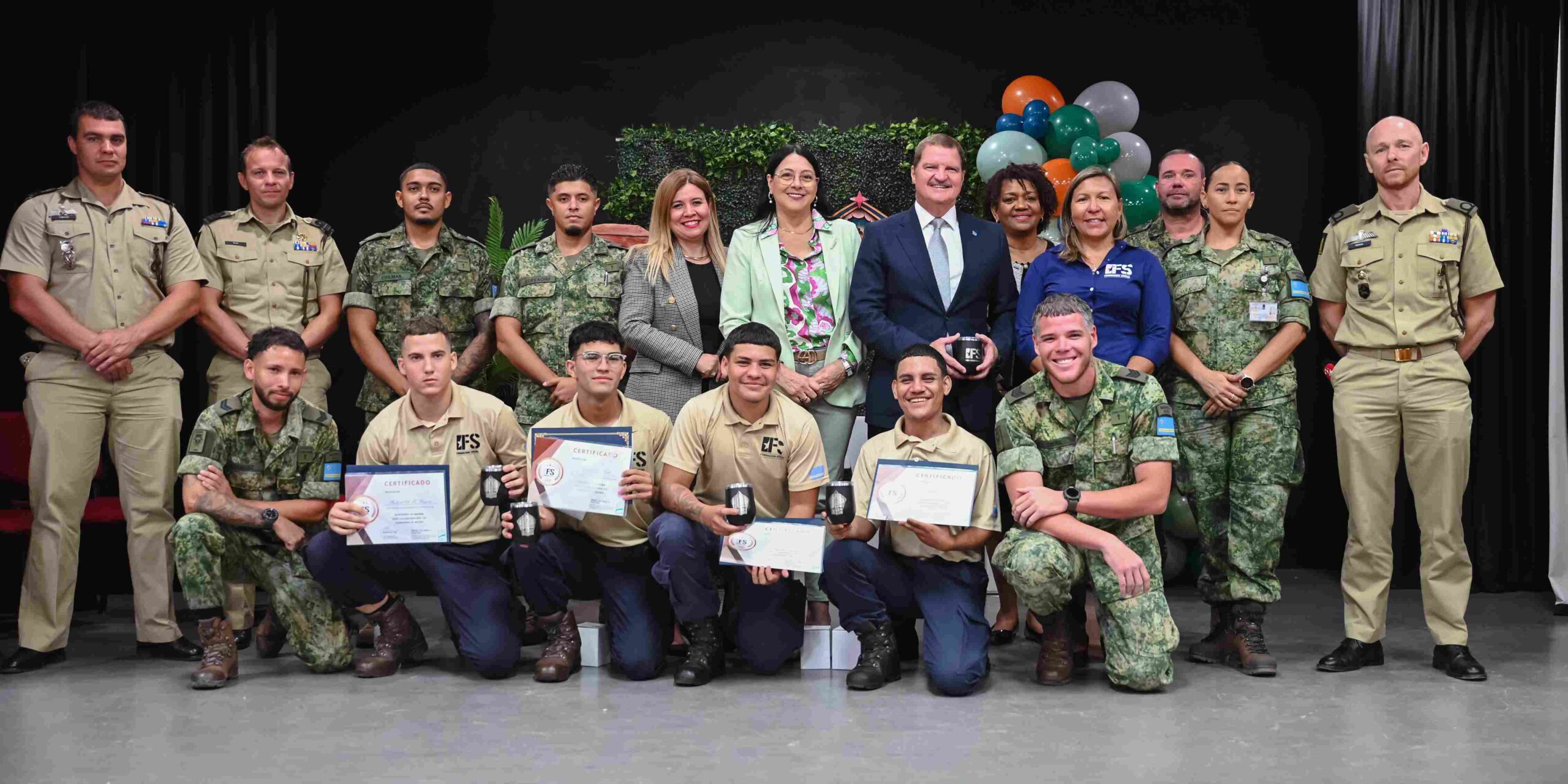 Minister Wyatt-Ras presents Phase 2 certificates to SVT-20 graduates